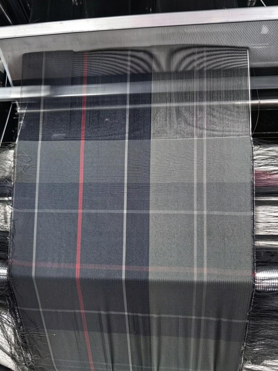 Custom Woven Fabric Development 10 Yarn-dyed special weave construction in 50D plus 40D polyester spandex, warp and weft