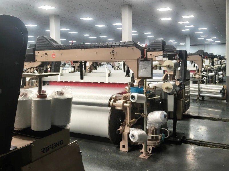 Water-jet loom hall weaving the polyester 4-way stretch series