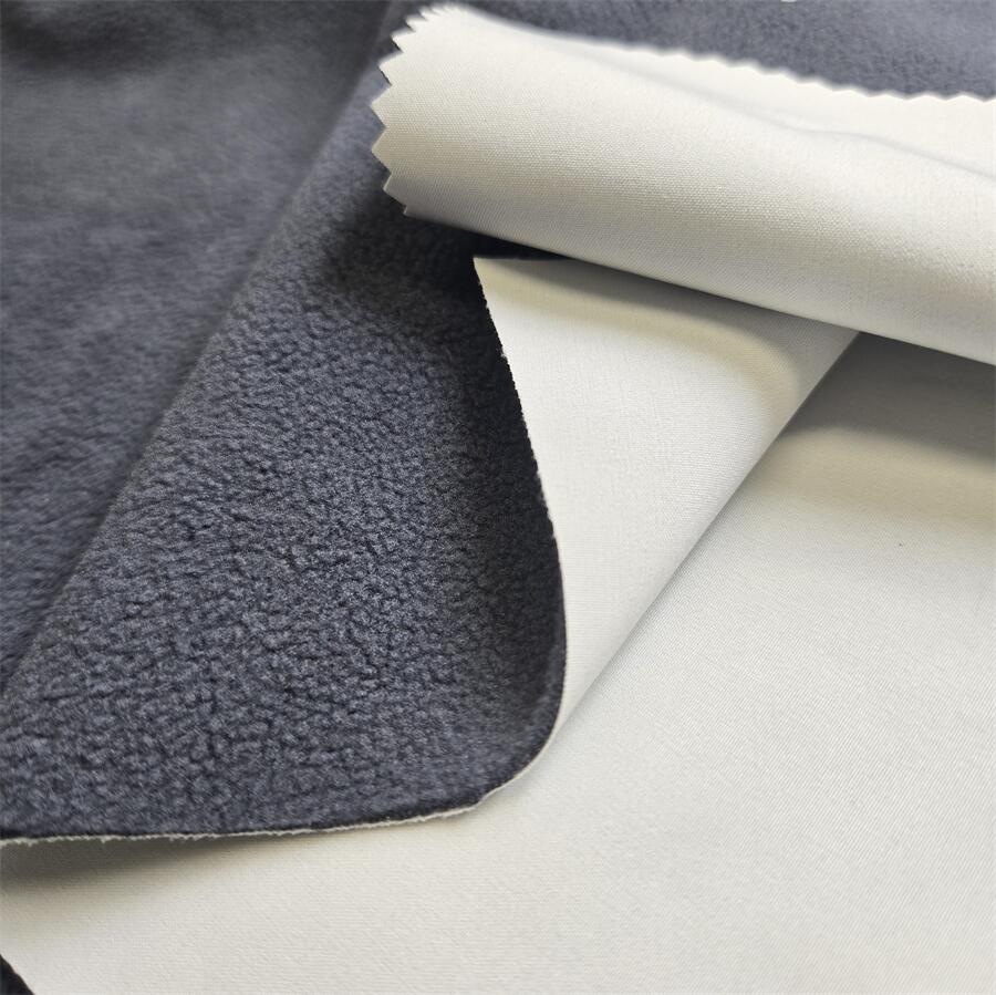 Fabric swatch — 100D 4-Way Stretch laminated with low-permeability TPU 0.008 mm + polar fleece, face texture close-up