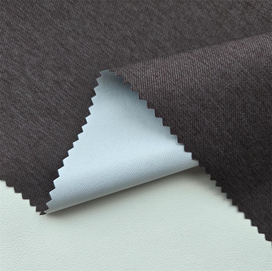 Fabric swatch — Cationic Gabardine laminated with low-permeability white TPU 0.012 mm, face texture close-up
