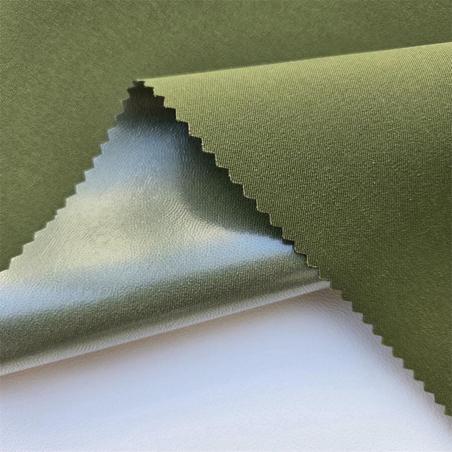 Fabric swatch — Cotton-Touch T400 Twill laminated with mid-permeability TPU 0.02 mm, face texture close-up