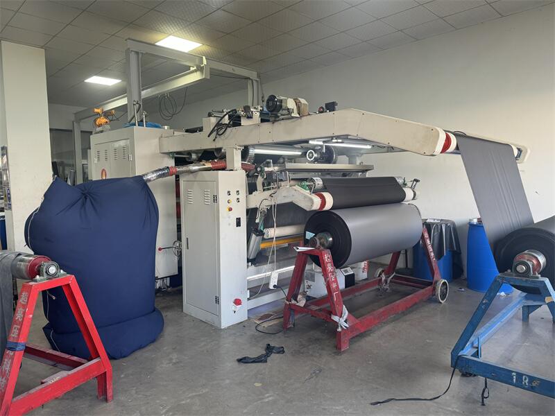 PUR hot-melt lamination machine bonding TPU membrane to woven stretch fabric on the Mifu bonding line