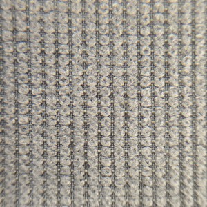 Nylon dobby 4-way stretch mountain cloth showing its jacquard peak-valley micro-texture